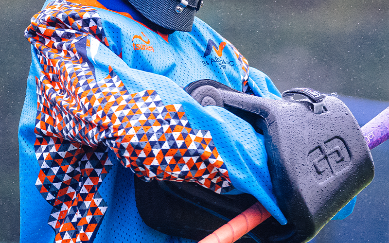 Goalkeeper hand pads and stick with Bright Geometric top