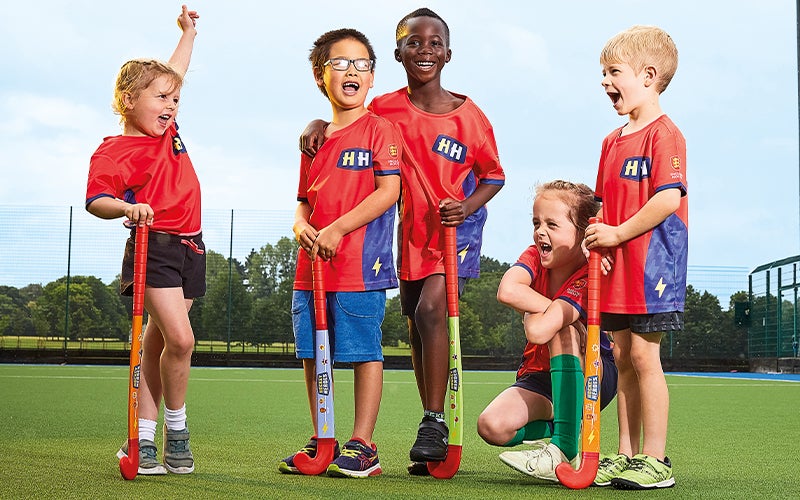 Hockey Heroes players smiling enjoying hockey