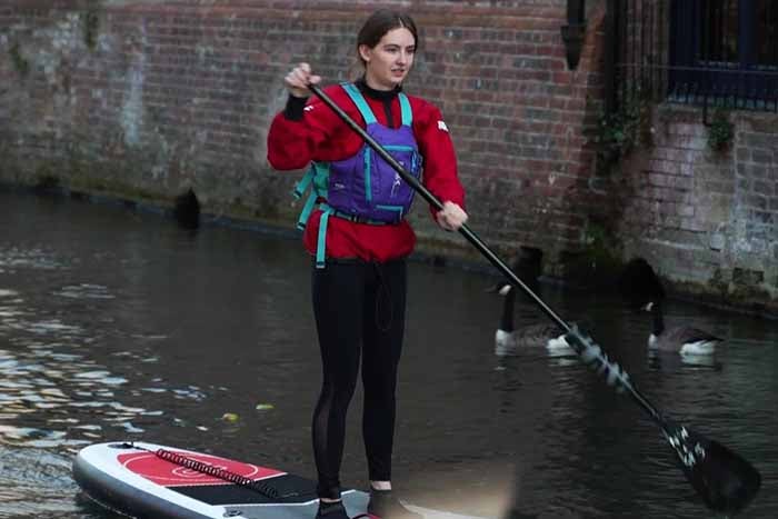 Eloise on a paddle board