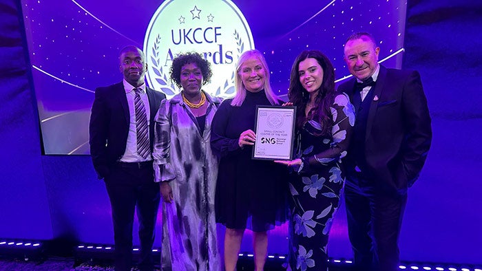 SNG contact centre team accepting award