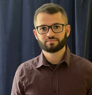 Open University research graduate, Josmario.