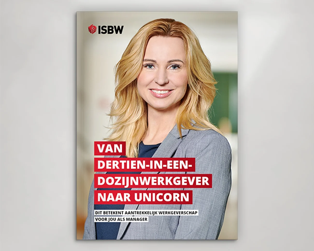 Voortkant ISBW whitepaper 'Van dertien-in-een-dozijnmedewerker naar unicorn' met blonde vrouw in grijs jasje
