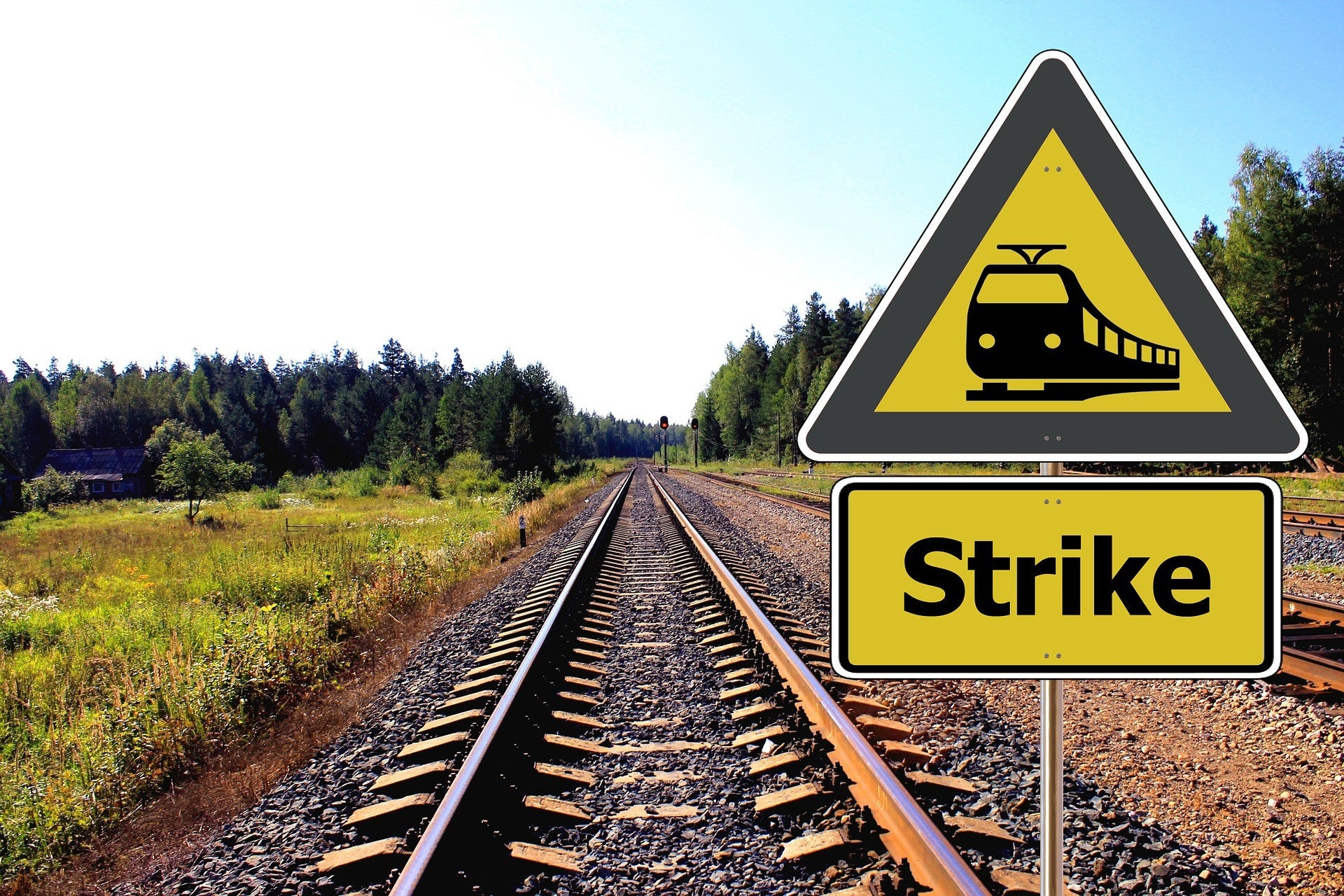 Treinrails en plaatje stakingen