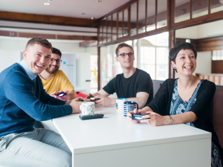 The Quba team enjoying a lunchtime Playstation game