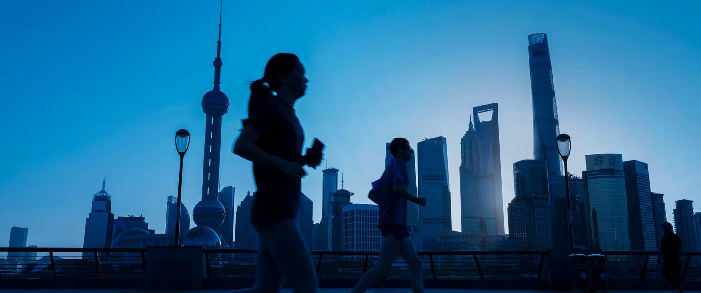 breaker image showing person running across city skyline