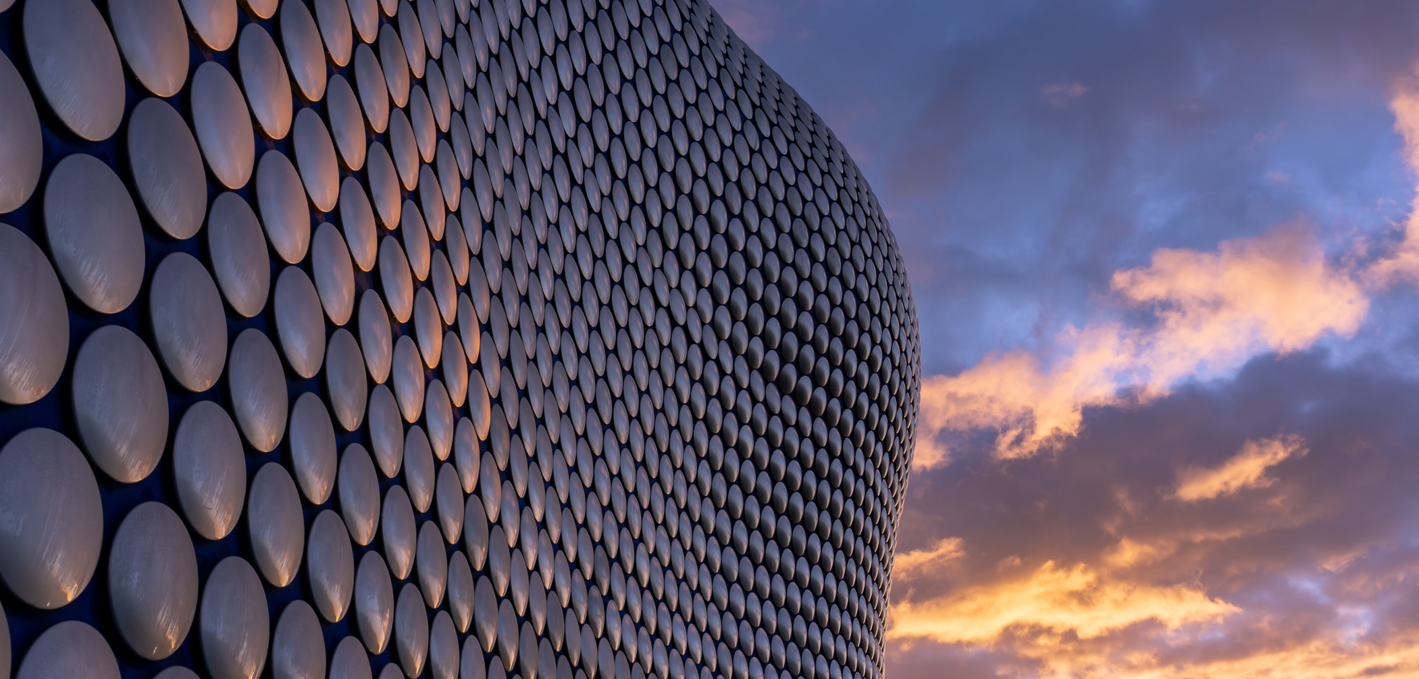 Image of the bullring centre in birmingham against an evening sky