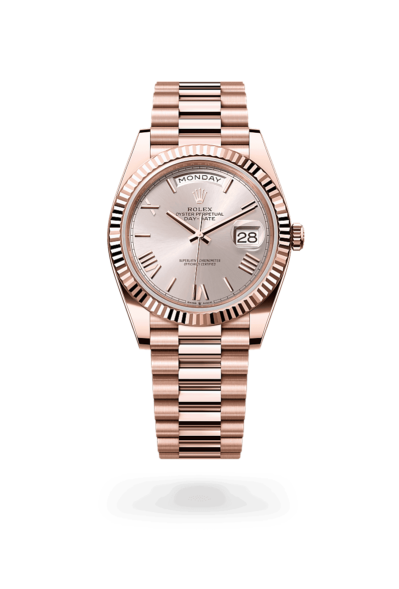 Rolex Day-Date 40 in Oyster, 40 mm, Everose-goud with a Sundust dial, Gekarteld bezel, and President, halfronde driedelige schakels bracelet