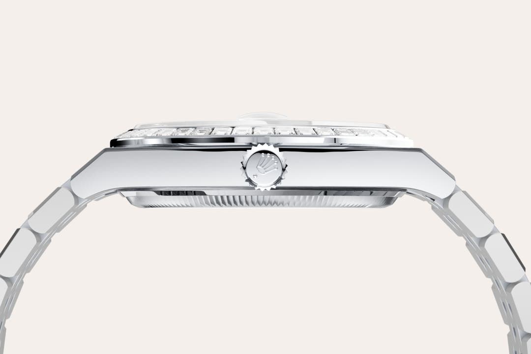 Rolex Land-Dweller 36 in Oyster, 36 mm, platinum and diamonds with a Ice blue, honeycomb motif set with diamonds dial, Set with diamonds bezel, and Flat Jubilee, five-piece solid links bracelet