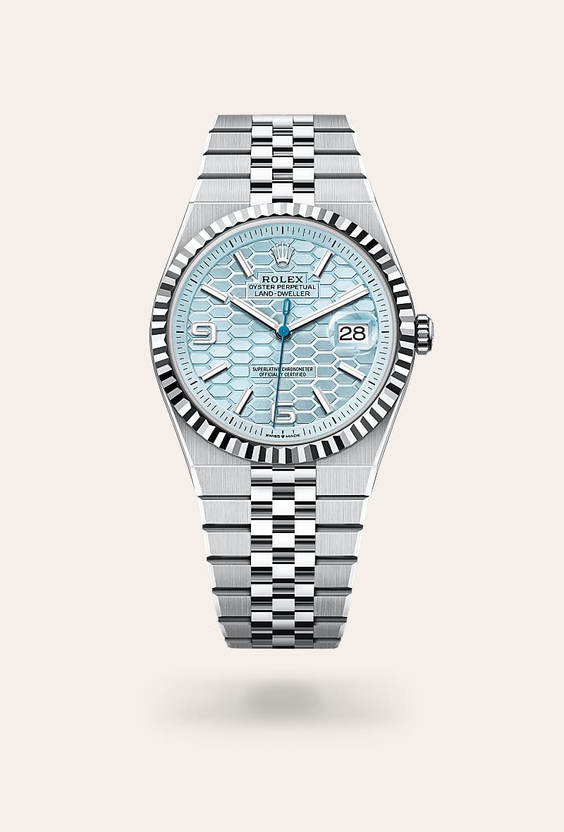 Rolex Land-Dweller 40 in Oyster, 40 mm, platinum with a Ice blue, honeycomb motif dial, Fluted bezel, and Flat Jubilee, five-piece solid links bracelet