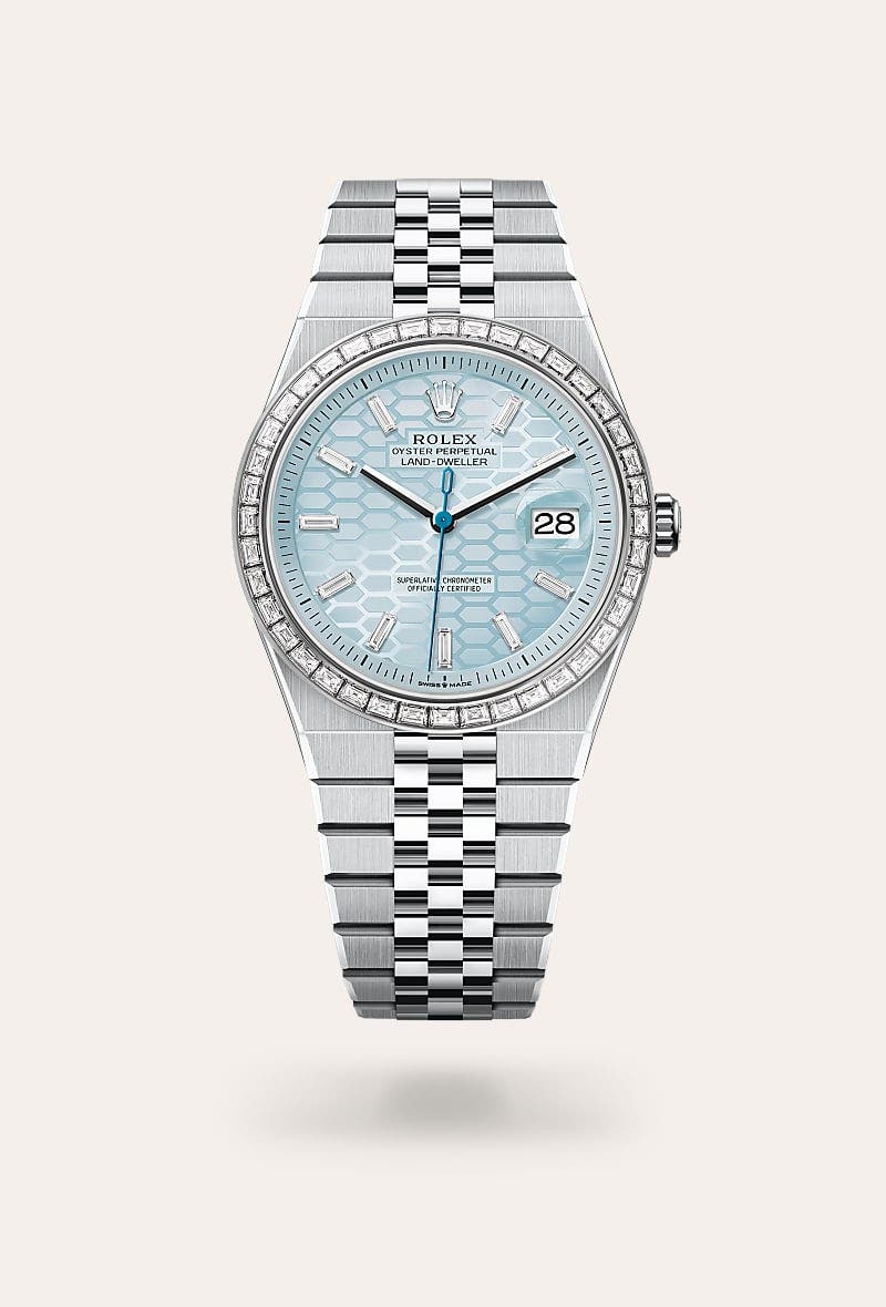 Rolex Land-Dweller 40 in Oyster, 40 mm, platina en diamanten with a IJsblauw, honingraatmotief bezet met diamanten dial, Bezet met diamanten bezel, and Flat Jubilee, vijfdelige massieve schakels bracelet