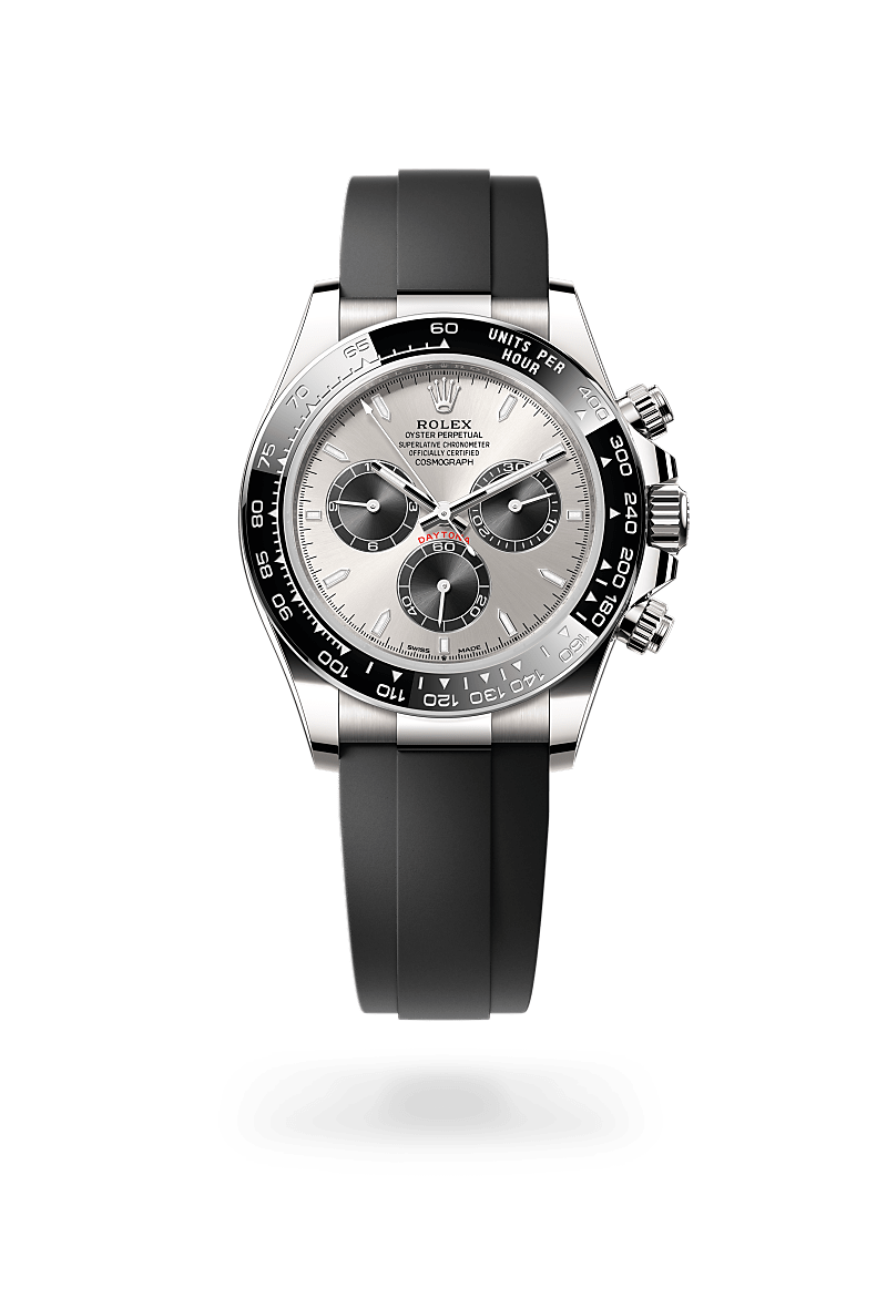 Rolex Cosmograph Daytona in Oyster, 40 mm, witgoud with a Staal en helderzwart dial, Zwarte Cerachrom-bezel uit één stuk keramiek met gevormde tachymetrische schaal bezel, and Oysterflex-band bracelet