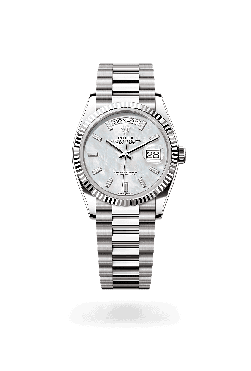 Rolex Day-Date 36 in Oyster, 36 mm, white gold with a White mother-of-pearl set with diamonds dial, Fluted bezel, and President, semi-circular three-piece links bracelet