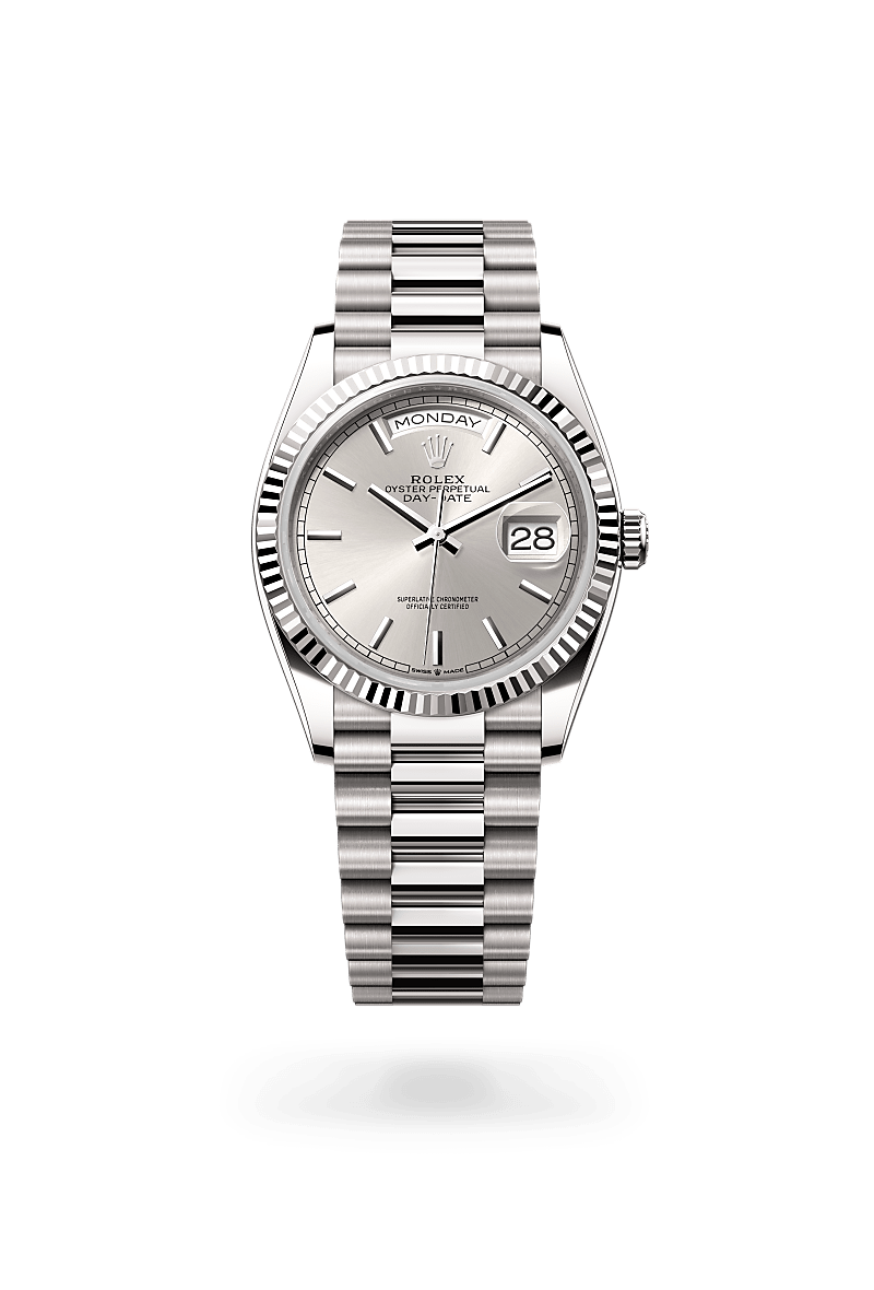 Rolex Day-Date 36 in Oyster, 36 mm, white gold with a Silver dial, Fluted bezel, and President, semi-circular three-piece links bracelet