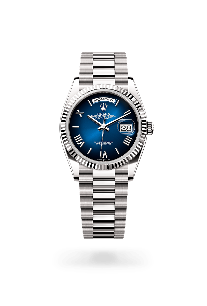 Rolex Day-Date 36 in Oyster, 36 mm, white gold with a Blue ombré dial, Fluted bezel, and President, semi-circular three-piece links bracelet