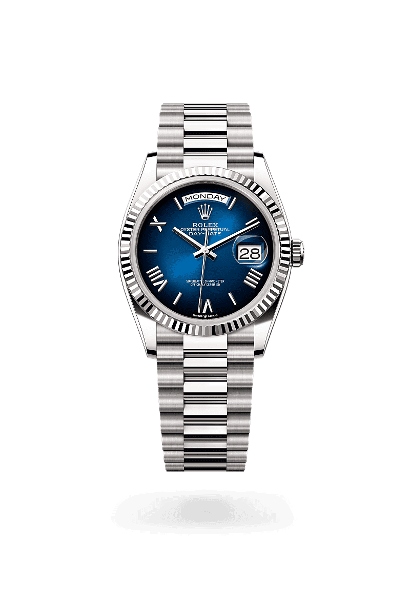 Rolex Day-Date 36 in Oyster, 36 mm, white gold with a Blue ombré dial, Fluted bezel, and President, semi-circular three-piece links bracelet