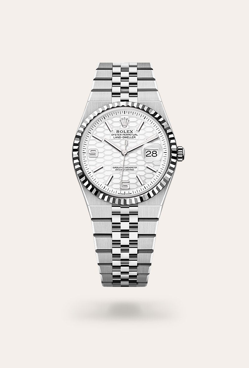 Rolex Land-Dweller 36 in Oyster, 36 mm, Oystersteel en witgoud with a Hagelwit, honingraatmotief dial, Gekarteld bezel, and Flat Jubilee, vijfdelige massieve schakels bracelet