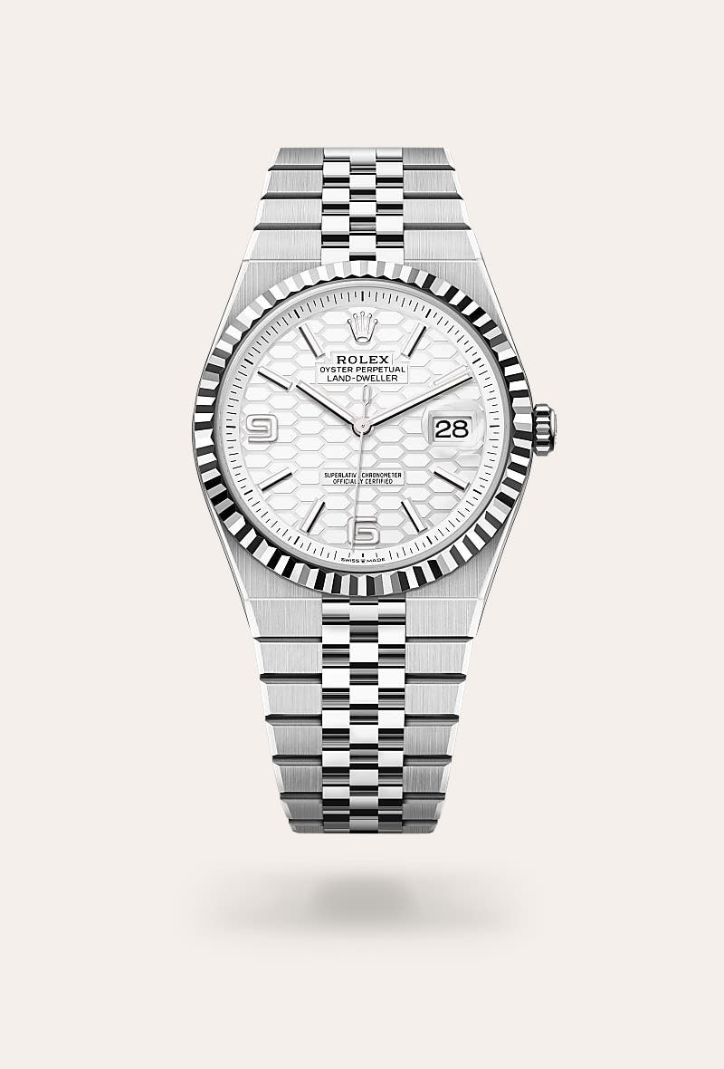 Rolex Land-Dweller 40 in Oyster, 40 mm, Oystersteel and white gold with a Intense white, honeycomb motif dial, Fluted bezel, and Flat Jubilee, five-piece solid links bracelet