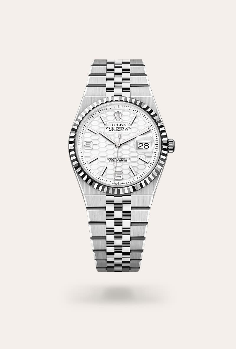 Rolex Land-Dweller 36 in Oyster, 36 mm, Oystersteel and white gold with a Intense white, honeycomb motif dial, Fluted bezel, and Flat Jubilee, five-piece solid links bracelet