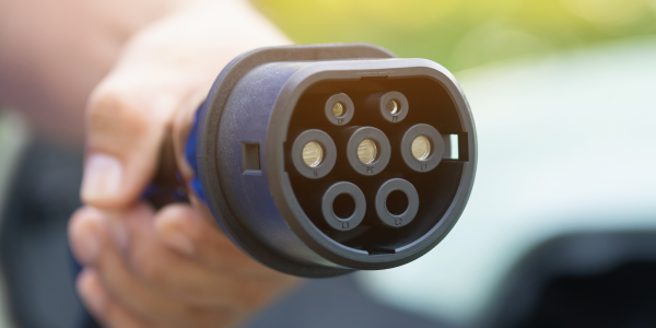 Destination charging plug