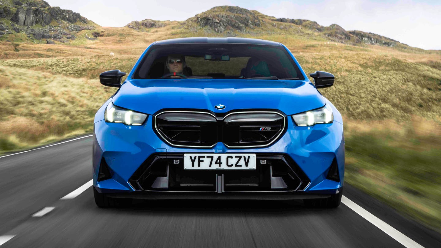 BMW M5 driving front view