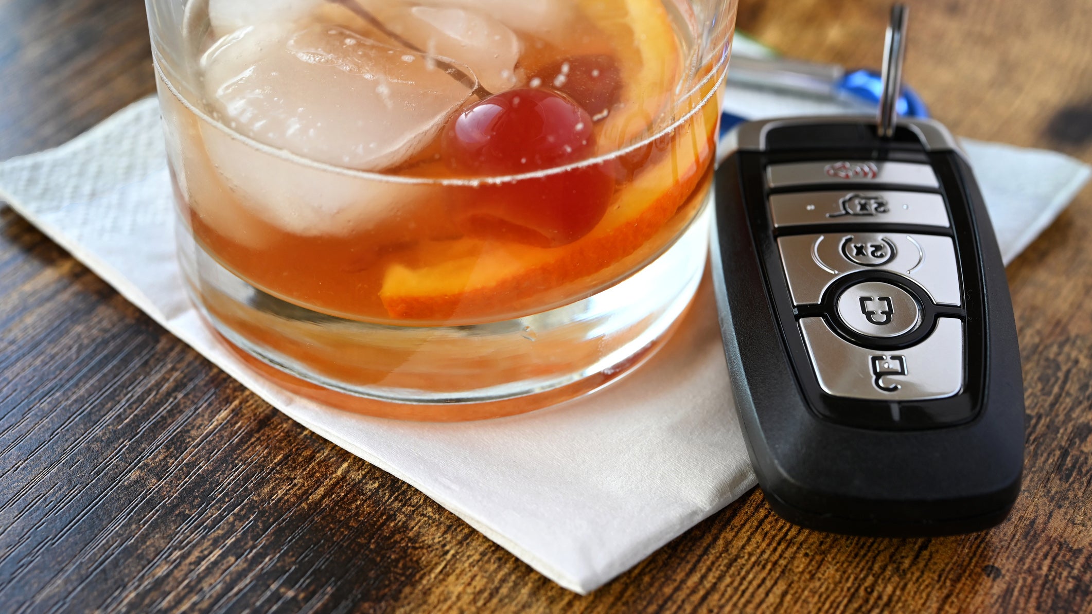 Alcoholic drink next to car keys