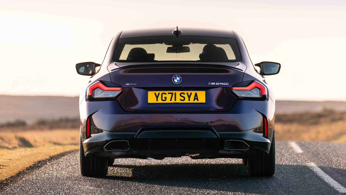 BMW M240i driving rear view