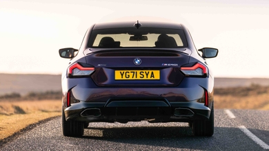 BMW M240i driving rear view
