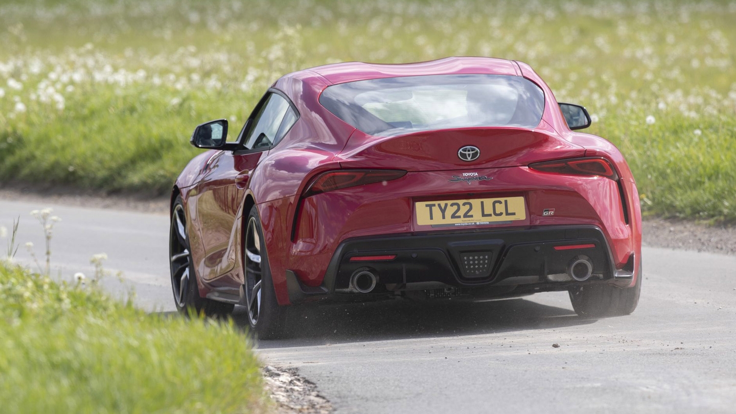 Toyota GR Supra driving rear view