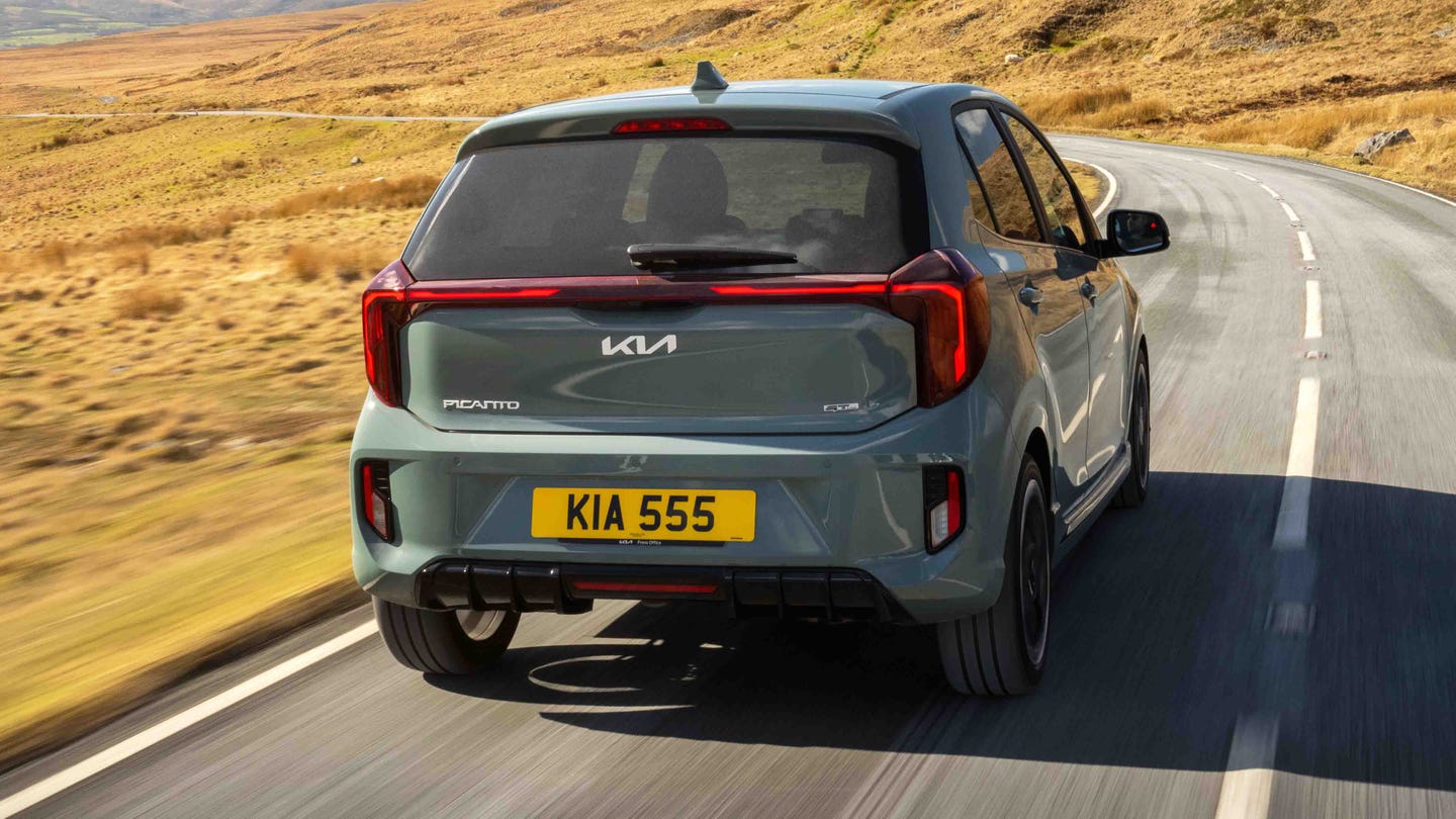 Kia Picanto driving rear view 