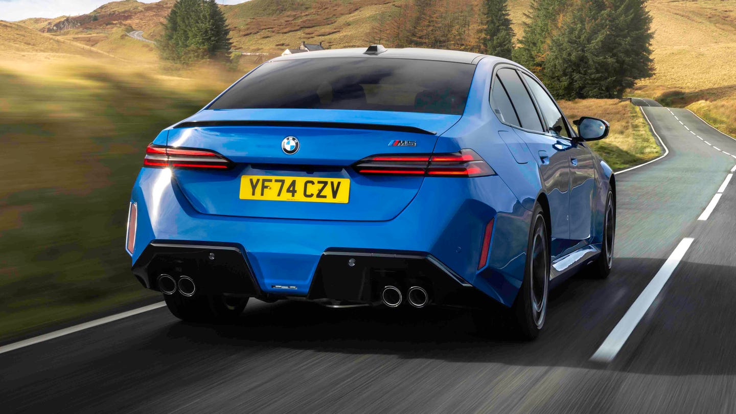 BMW M5 driving rear view