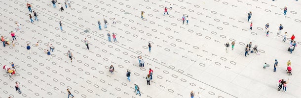 People standing on digital code
