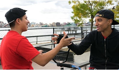 Two friends who are doing an handshake