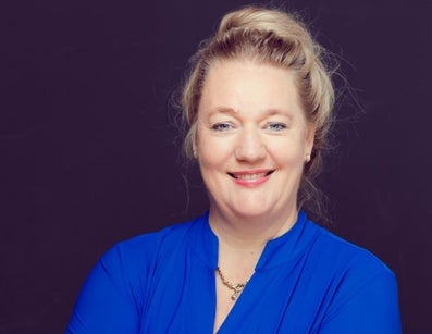 A woman in a blue shirt