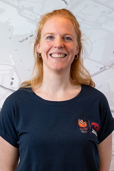 Top athlete Marie Hoogstraten smiling at the camera