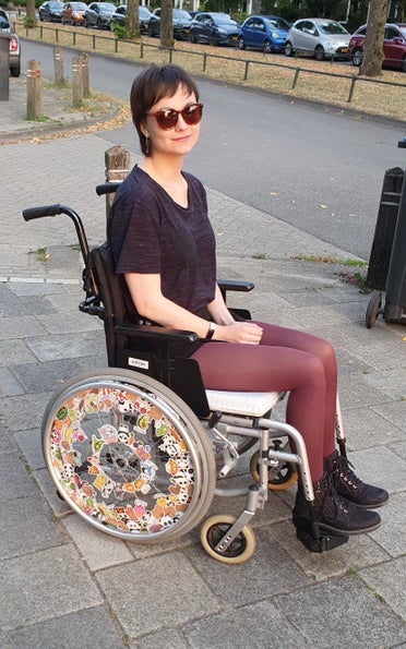 Long covid-patiënt in een rolstoel