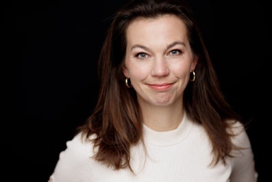 A woman smiling for the camera