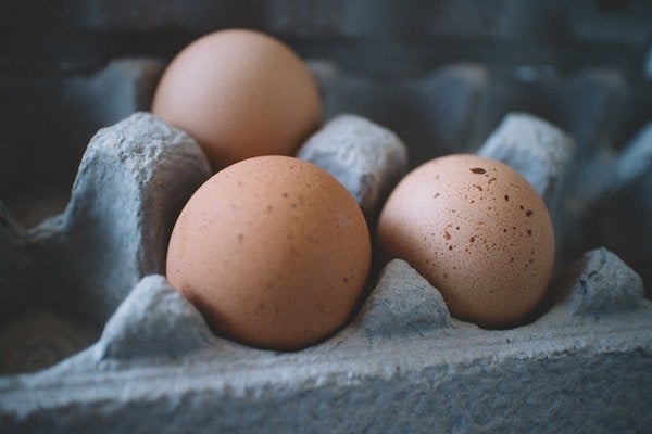 Eggs in a blue egg carton