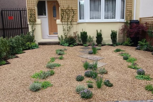 A front-garden can have space for plants and parking