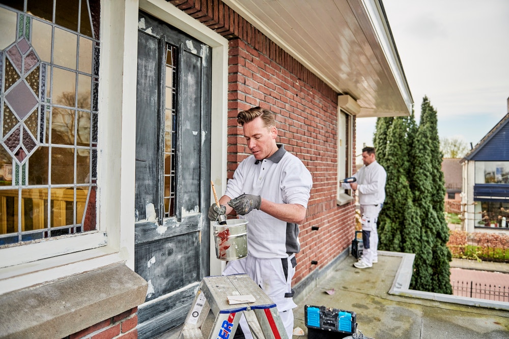 Buitenschilders aan het werk