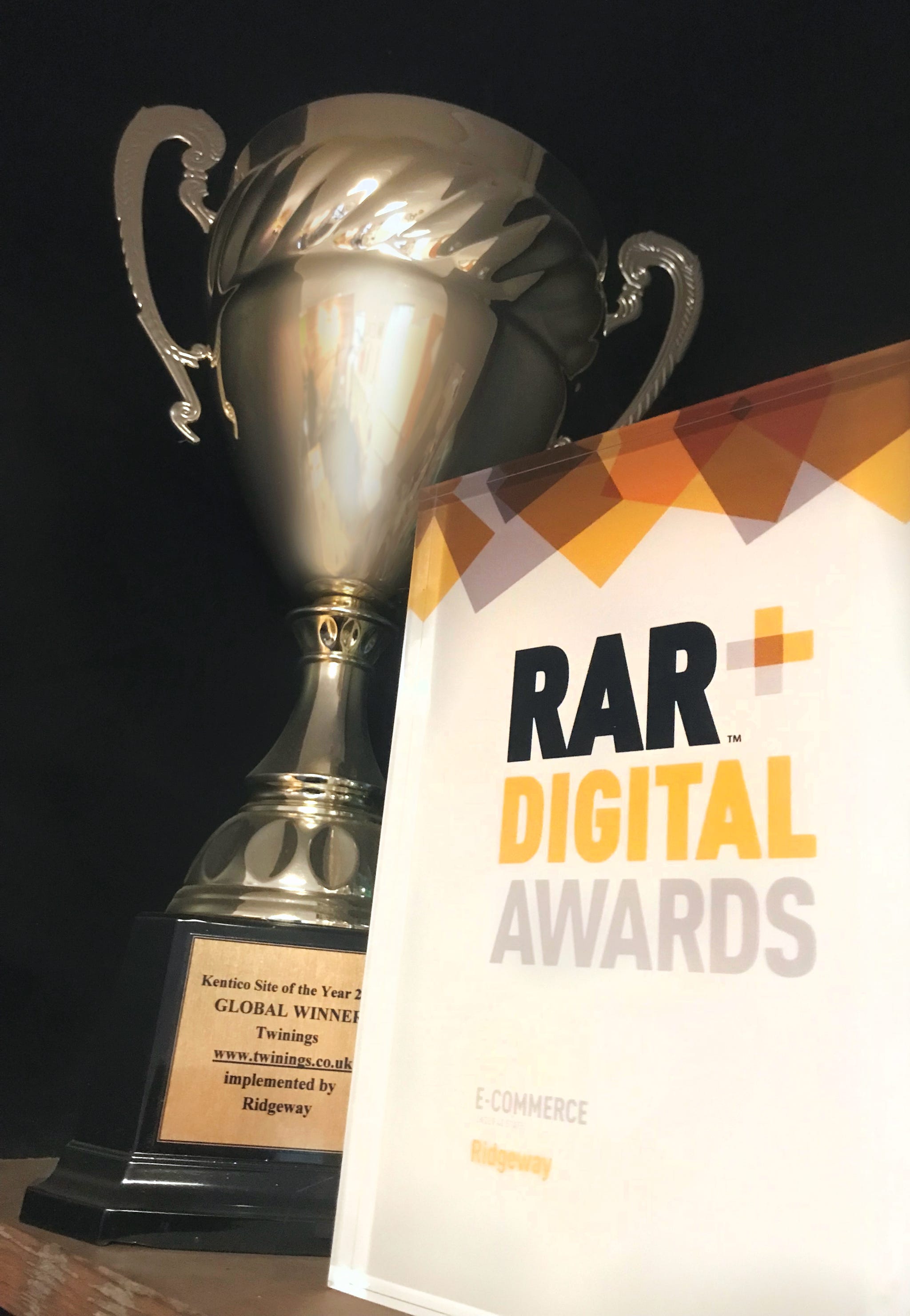 Kentico Global Winner and RAR Digital awards trophies 