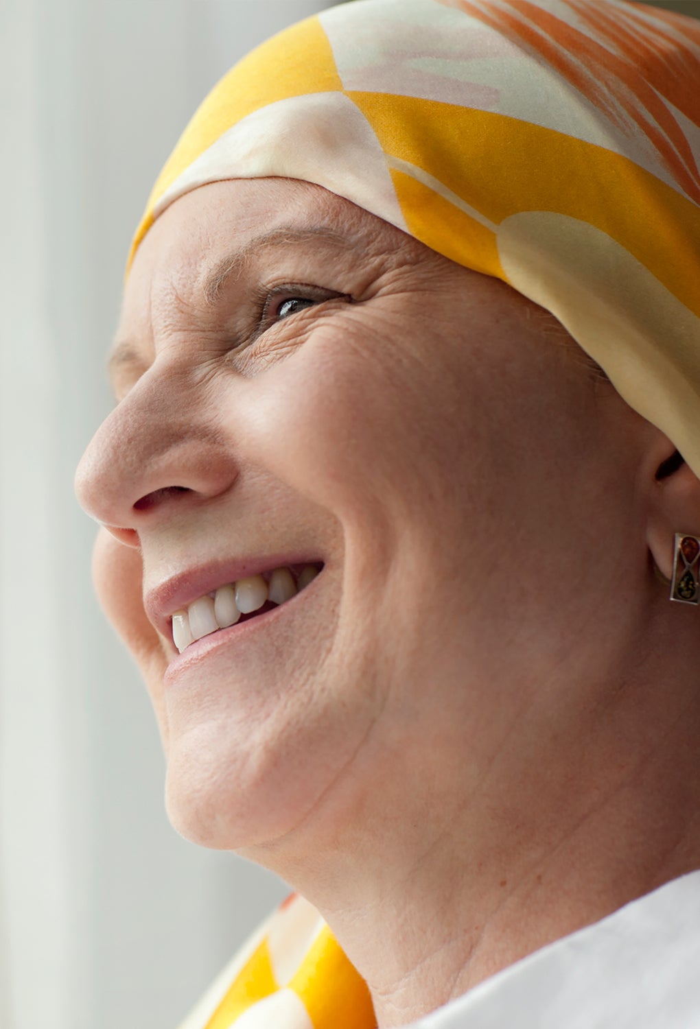 Reframe support lady with the yellow head scarf