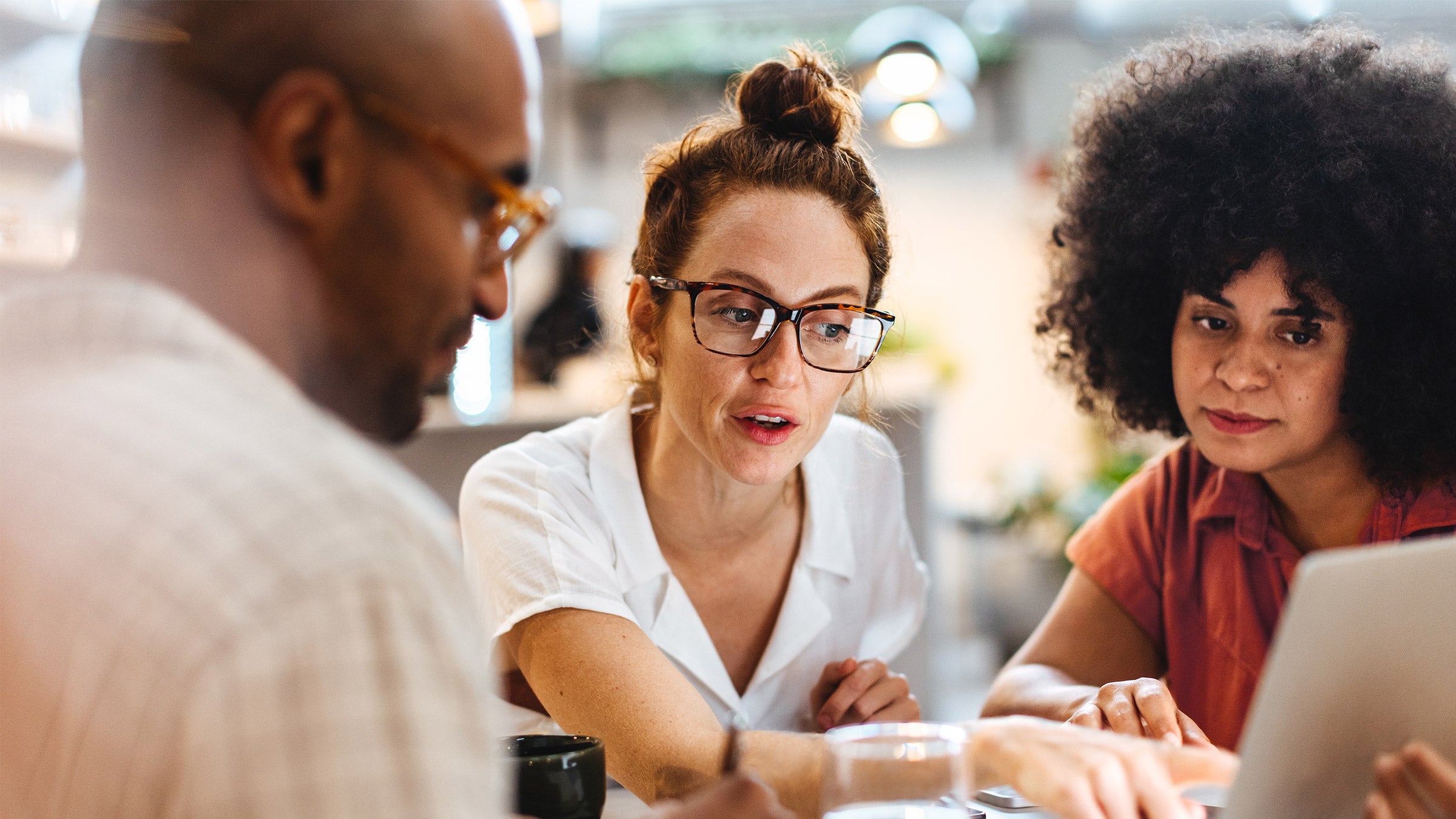 Employees discussing changes to National Insurance 