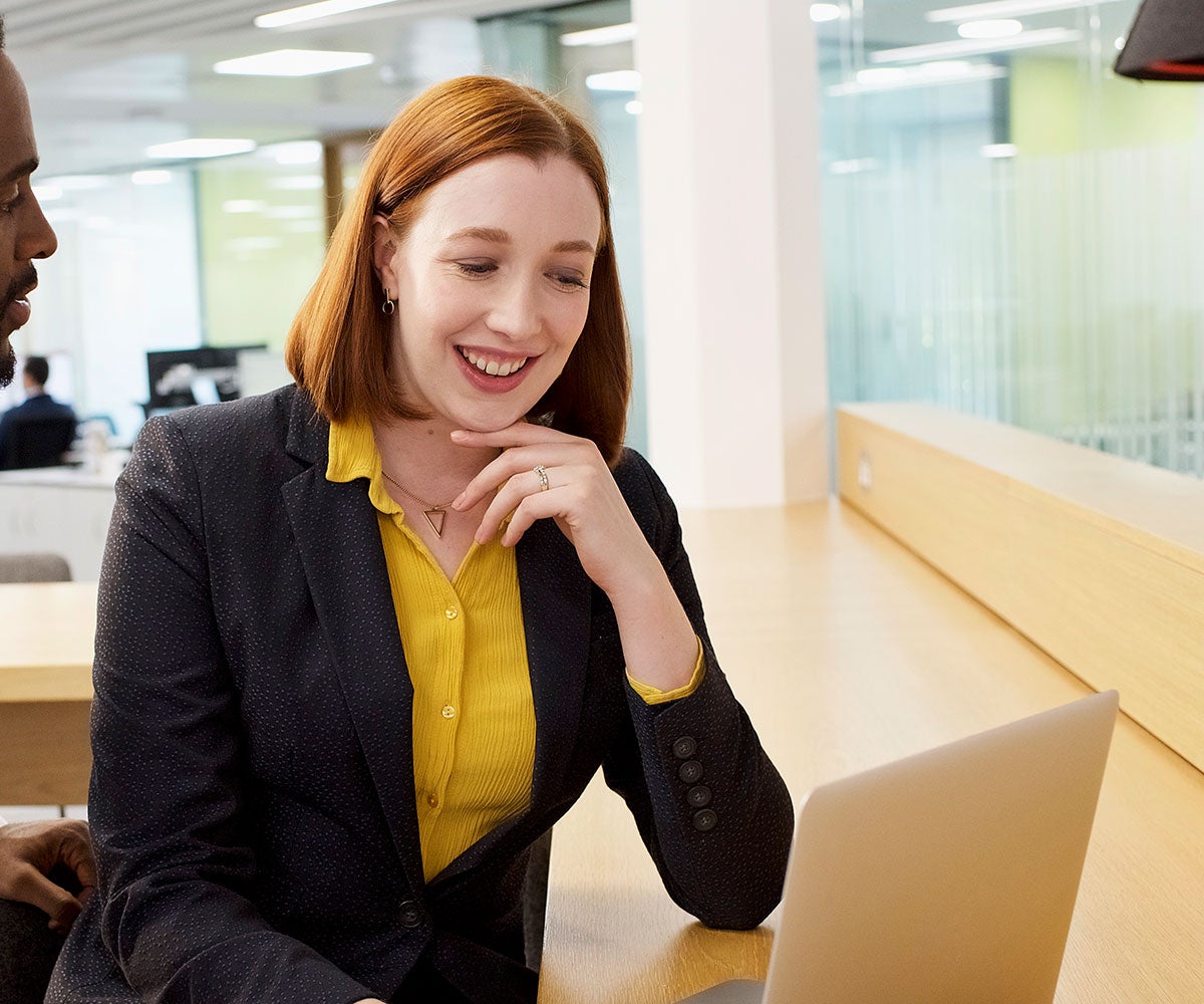 Lady in the office having a conversation