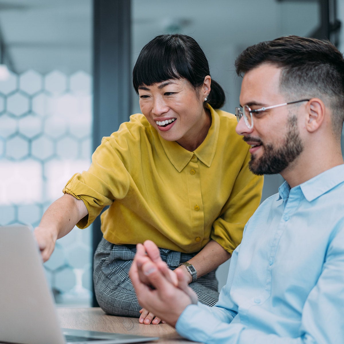 Employees collaborating in the office