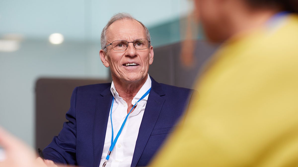 Man having a conversation in the office