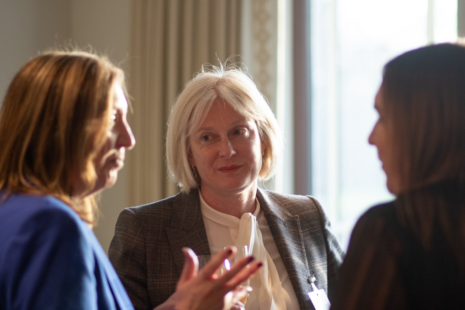 Networking event group of three leaders