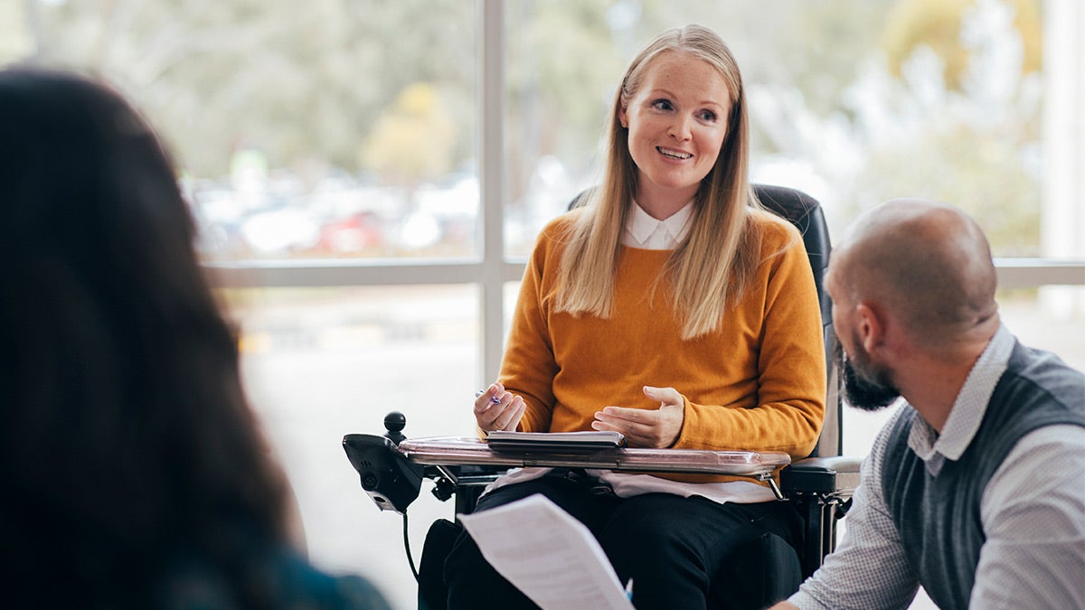 Disable woman in a yellow top