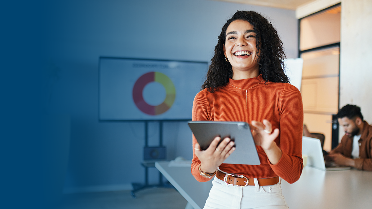 A woman holding a tablet