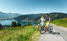 Radfahren mit Blick auf den Zeller See, in Zell am See-Kaprun © Zell am See-Kaprun Radfahren mit Blick auf den Zeller See, in Zell am See-Kaprun © Zell am See-Kaprun