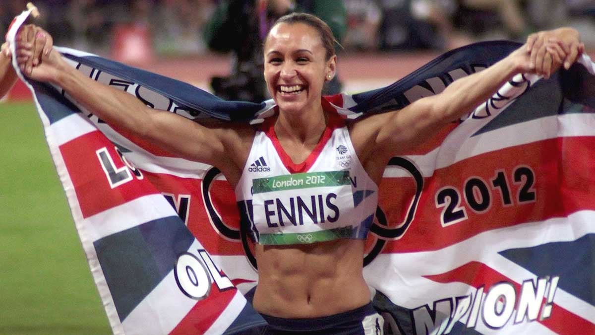 An image of Dame Jessica Ennis-Hill running with the union flag at the 2012 Olympics.